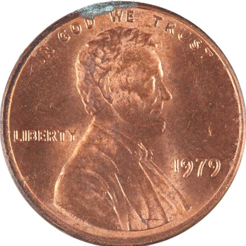 A 1979 Lincoln cent, obverse, with verdigris at the rim