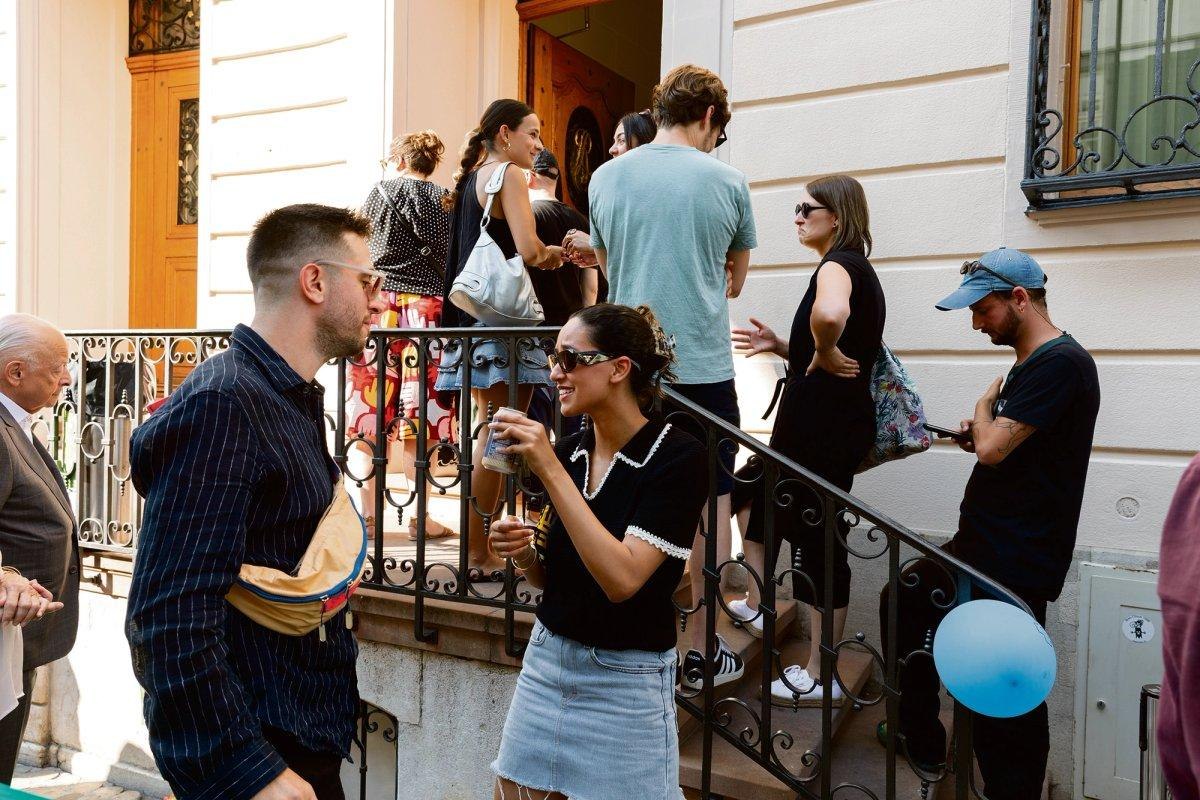 Visitors on the steps and balcony of the former bank on Rittergasse during Basel Social Club
